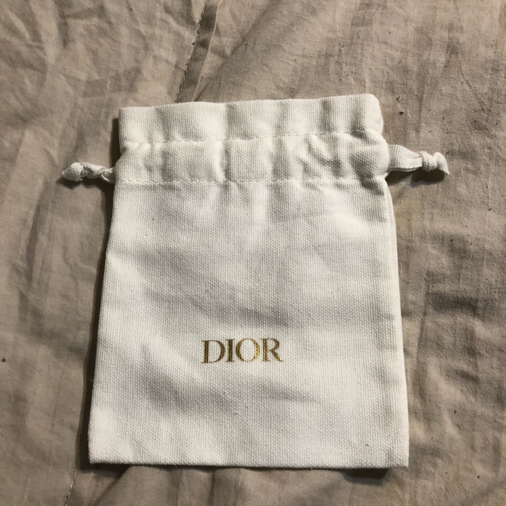 NWOT Dior Cream Drawstring Bag with Gold Logo
